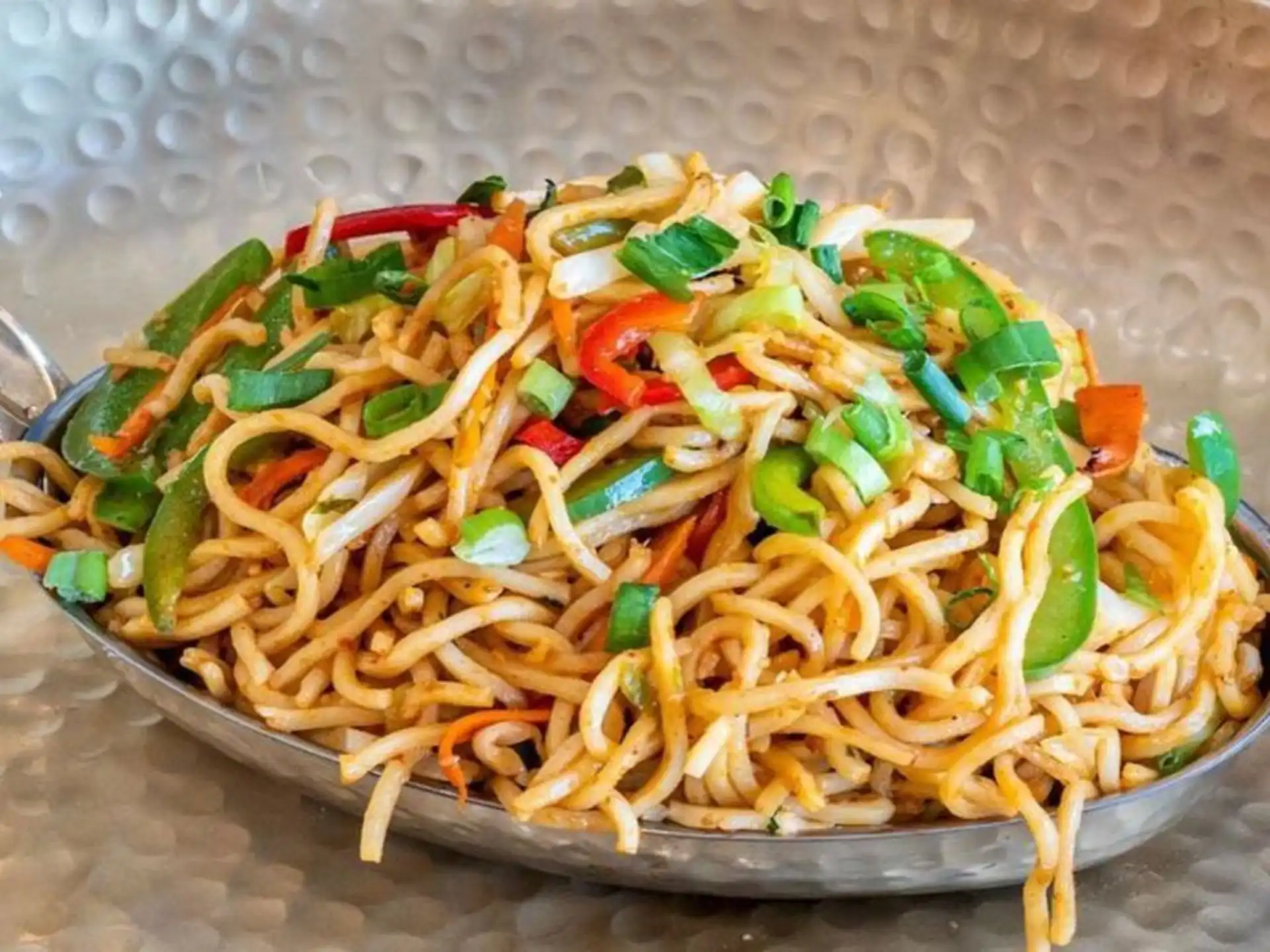Schezwan Noodles with Veg Manchurian balls