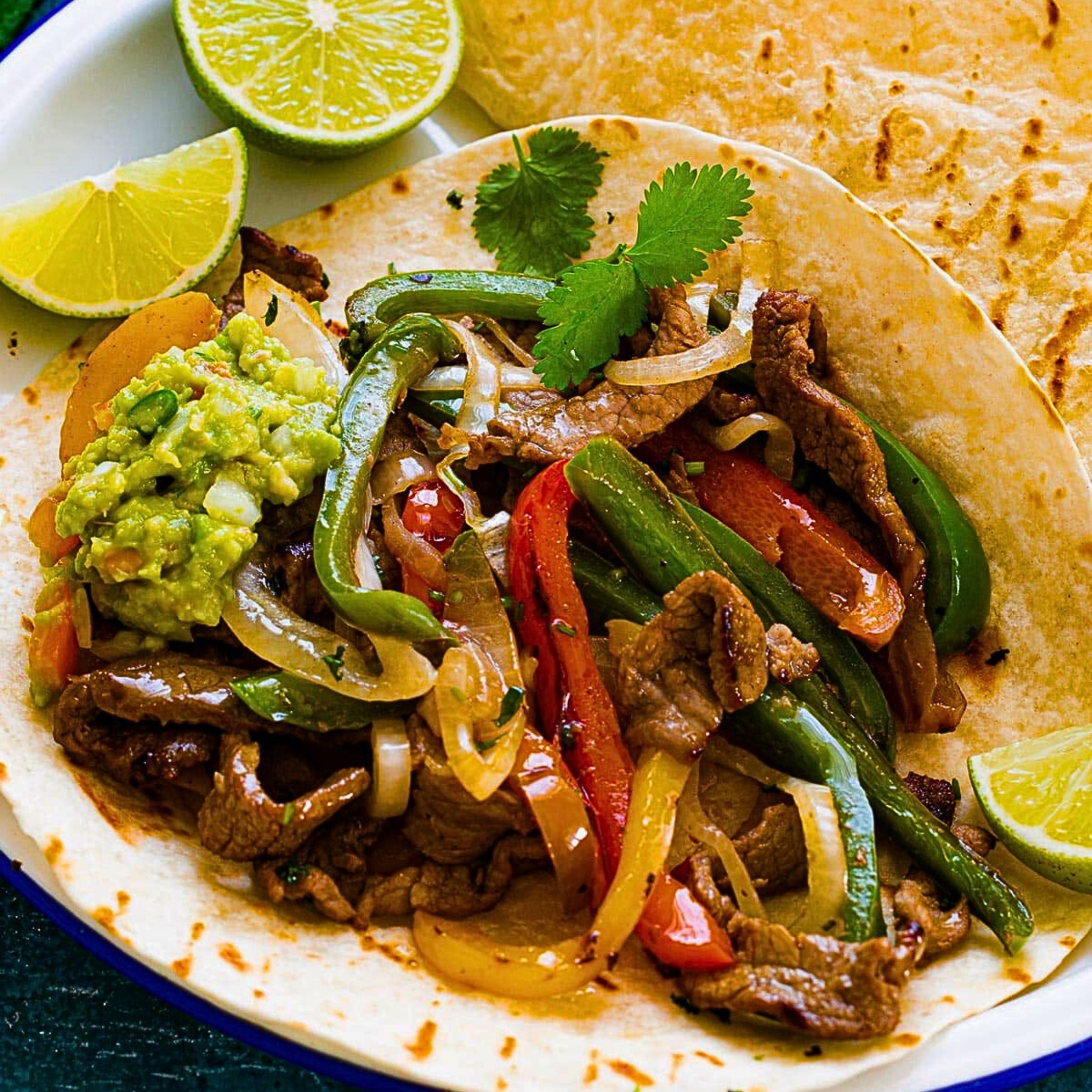 Fajitas de Res (Rice, beans & tortillas)