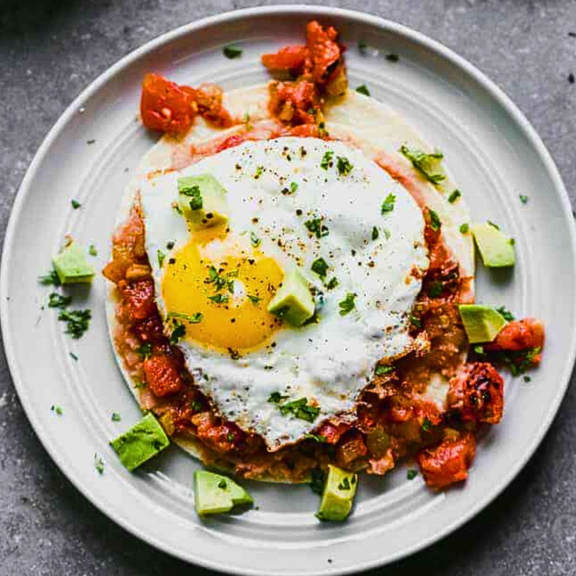 Huevos Rancheros (Refried beans, Spanish rice, tortillas)